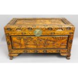 A Chinese carved camphor wood chest, 40.25in wide