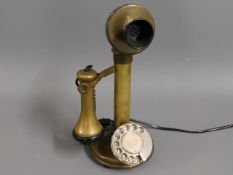 A British Telecom brass candlestick phone no.08150