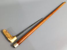 A Malacca sword stick with horn handle, 34.5in lon
