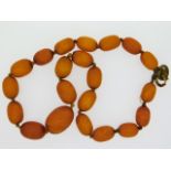 A set of Victorian butterscotch amber beads, 16in