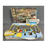 An SRM scale model racing track with accessories,