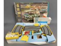 An SRM scale model racing track with accessories,