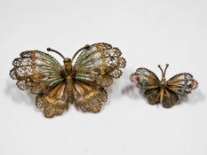A pair of .800 silver gilt butterfly brooches