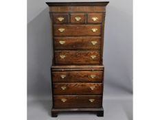 A George III oak chest on chest with brass fitting