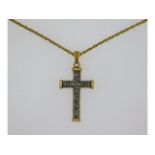A 9ct gold necklace with cross pendant set with 0.