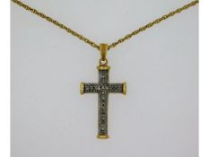 A 9ct gold necklace with cross pendant set with 0.