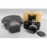 A Nikon FM2 35mm film camera with case & box