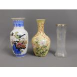 Two Oriental vases twinned with a silver rimmed gl