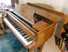 A 1936 walnut Steinway baby grand piano, serial nu