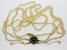 An antique three string cultured pearl necklace wi