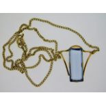 A 9ct gold chain & pendant set with topaz, fault t