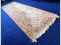 A decorative cream & floral design wool runner, 10