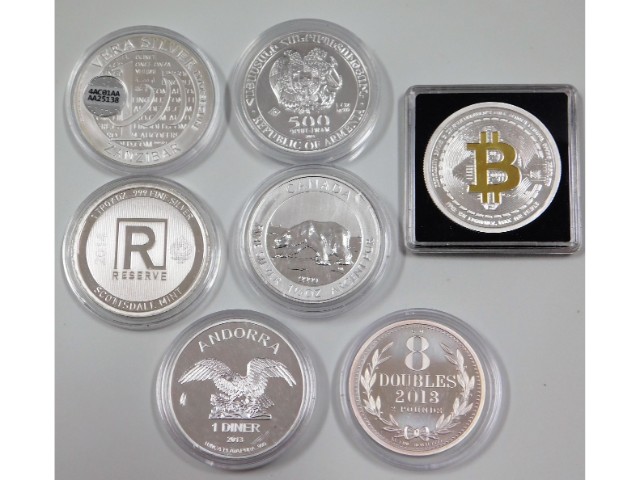 Seven .999 silver proof collectable coins & crowns