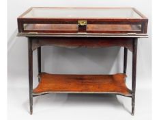 An antique jewellers glazed mahogany display case,