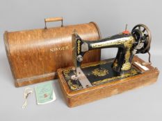 A cased Singer sewing machine