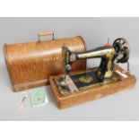 A cased Singer sewing machine