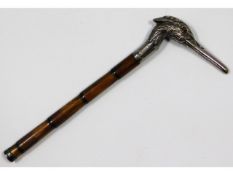 A 1903 London silver parasol handle in form of a h