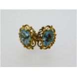 A pair of 9ct gold earrings set with topaz, 1.6g,