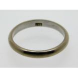 An 18ct white gold band, size M/N, 2.5g