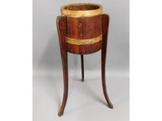 A brass bound oak planter, 31.75in tall