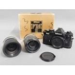 A Nikon FM2 35mm film camera with Nikon 43-86mm &