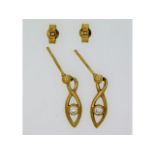 A pair of 9ct gold earrings set with 0.1ct of diam