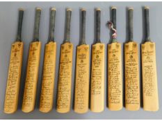 A quantity of nine miniature tour team cricket bat