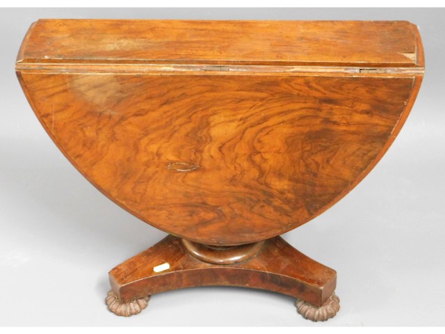 A 19thC. walnut drop leaf table, veneer lifting on