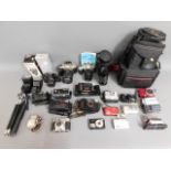 A quantity of cameras & equipment: Canon Sureshot,