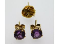 A pair of 9ct gold amethyst earrings twinned with