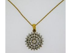 An 18ct gold necklace & pendant set with 1ct diamo