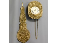 An early 20thC. French brass repousse wall clock,