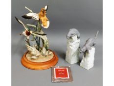 A pair of Lladro tigers, 8196 & 8197, one with rep