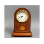 An Edwardian mantle clock with inlaid decor, 8.25i