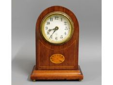 An Edwardian mantle clock with inlaid decor, 8.25i