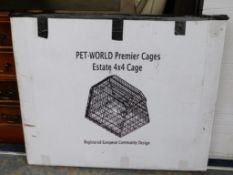 A boxed Pet World Premier Estate Cage 4x4