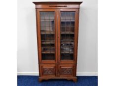 An antique oak bookcase, 73.5in high x 40in wide x