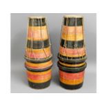 A pair of African tribal drums, 21in tall