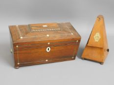 A 19thC. rosewood tea caddy inlaid with mother of