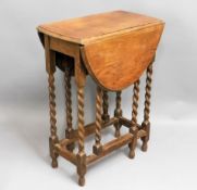 A small oak barley twist gate leg table, 30in high