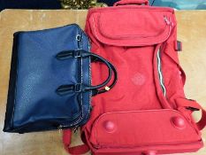 A Kipling collapsible travel case twinned with a Z