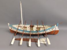 A model of rowing boat with sail, 31.5in wide x 21