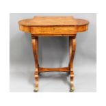 A 19thC. rosewood games table with contents & pull