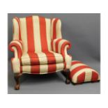 A stylish Peter Guild upholstered armchair with ma