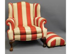 A stylish Peter Guild upholstered armchair with ma