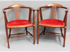 A pair of Edwardian mahogany hall chairs, 28.5in h