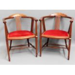 A pair of Edwardian mahogany hall chairs, 28.5in h