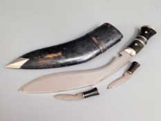 A kukri knife & scabbard, 17.5in long inclusive