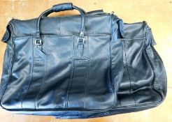 Two leather suit cases