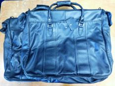 Two leather suit cases